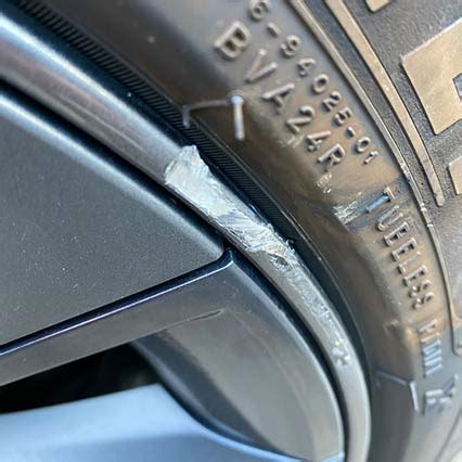 i scratched my tesla rim|my wheels are scratching again.